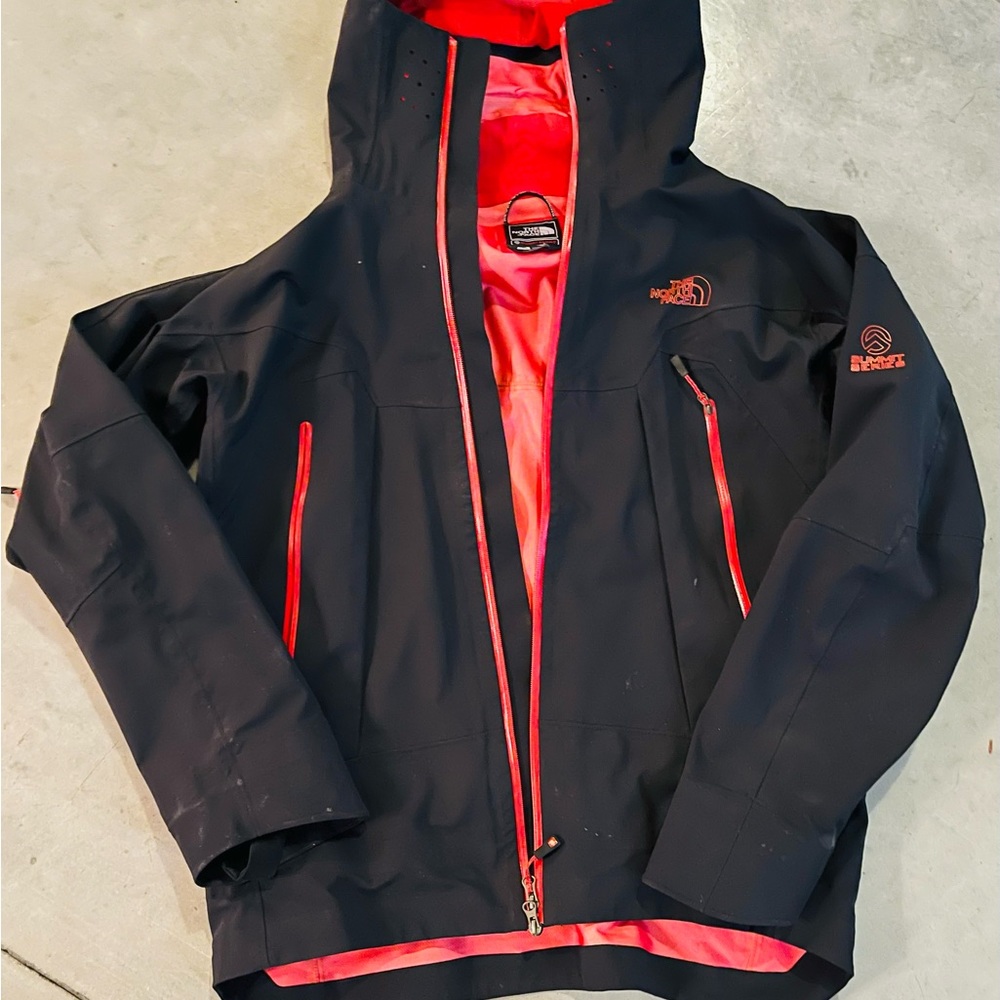 Red and black north face ski/snowboard jacket